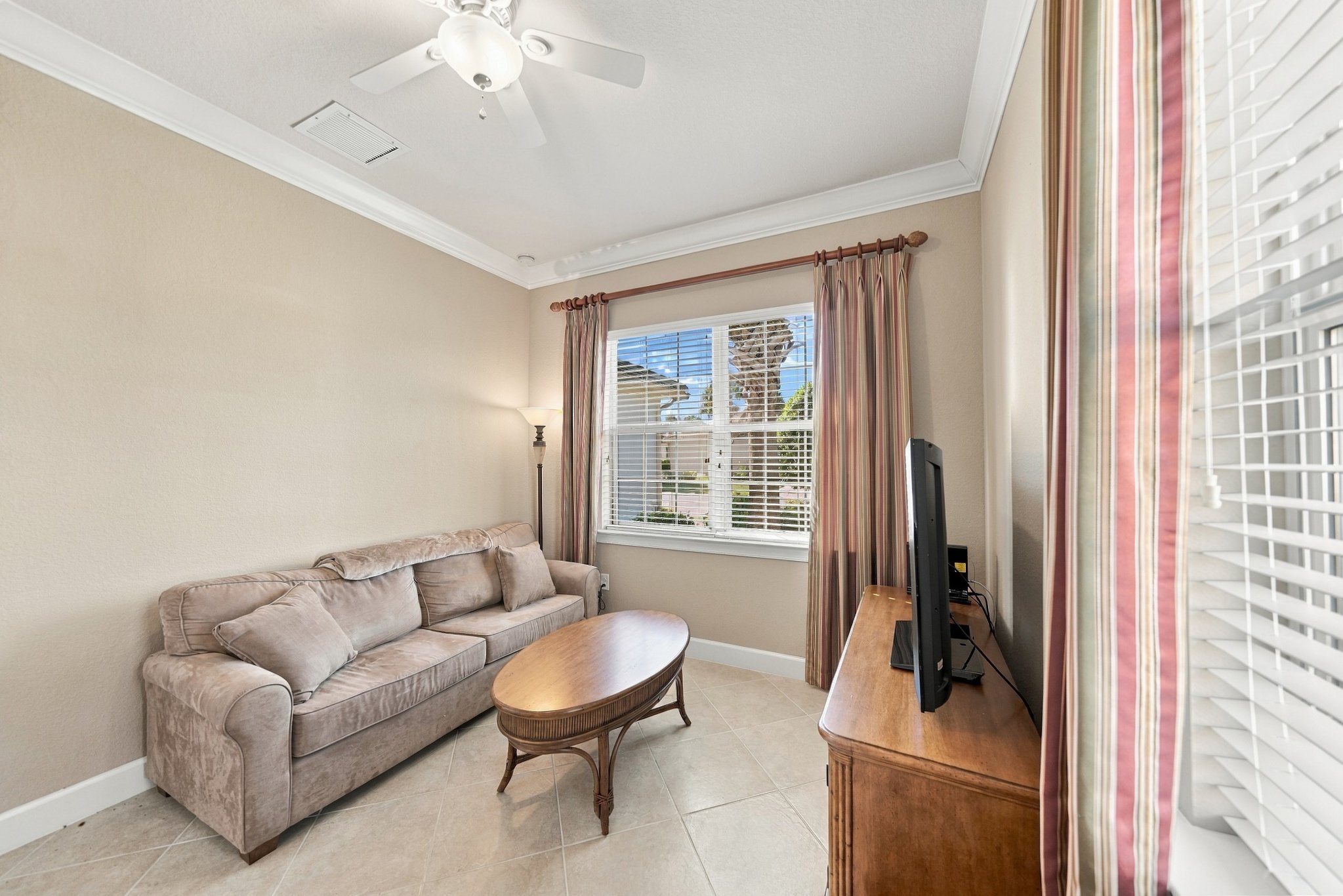 Professionally photographed living room with natural light