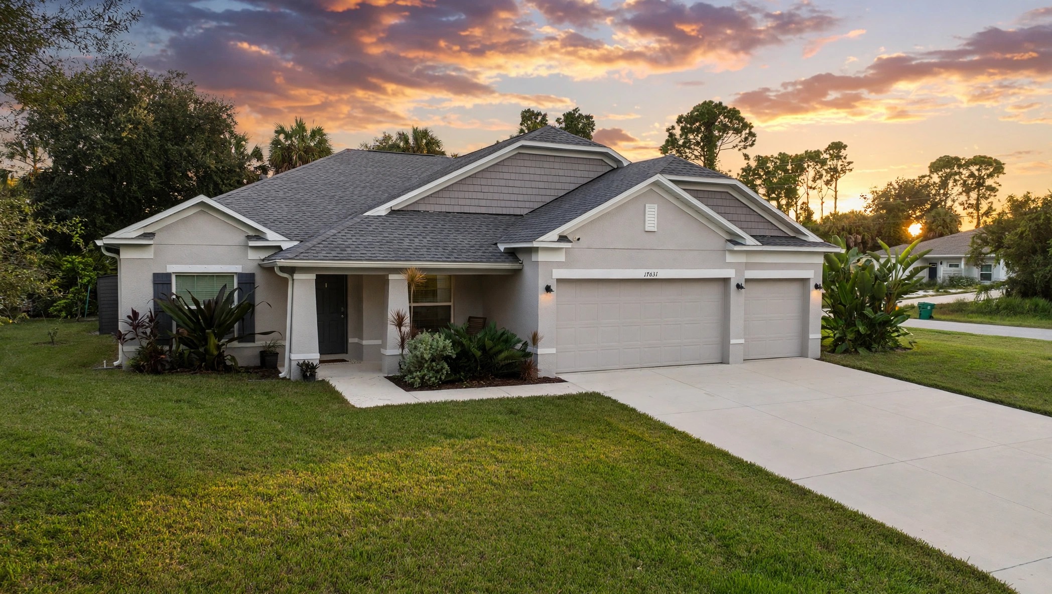 Second twilight exterior photo of a Florida home at sunset
